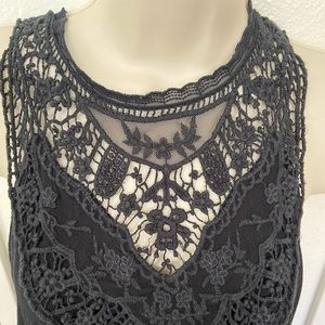 Black semi formal dress with guipure lace on the front. Very classy and soft